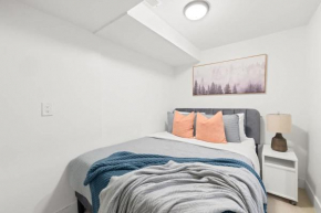 Trendy Ossington Hideaway Comfy Basement Retreat